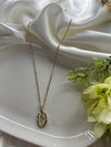 Golden Floral Emblem Necklace