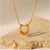 Golden Aura Horseshoe Pendant Necklace