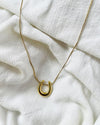 Golden Aura Horseshoe Pendant Necklace